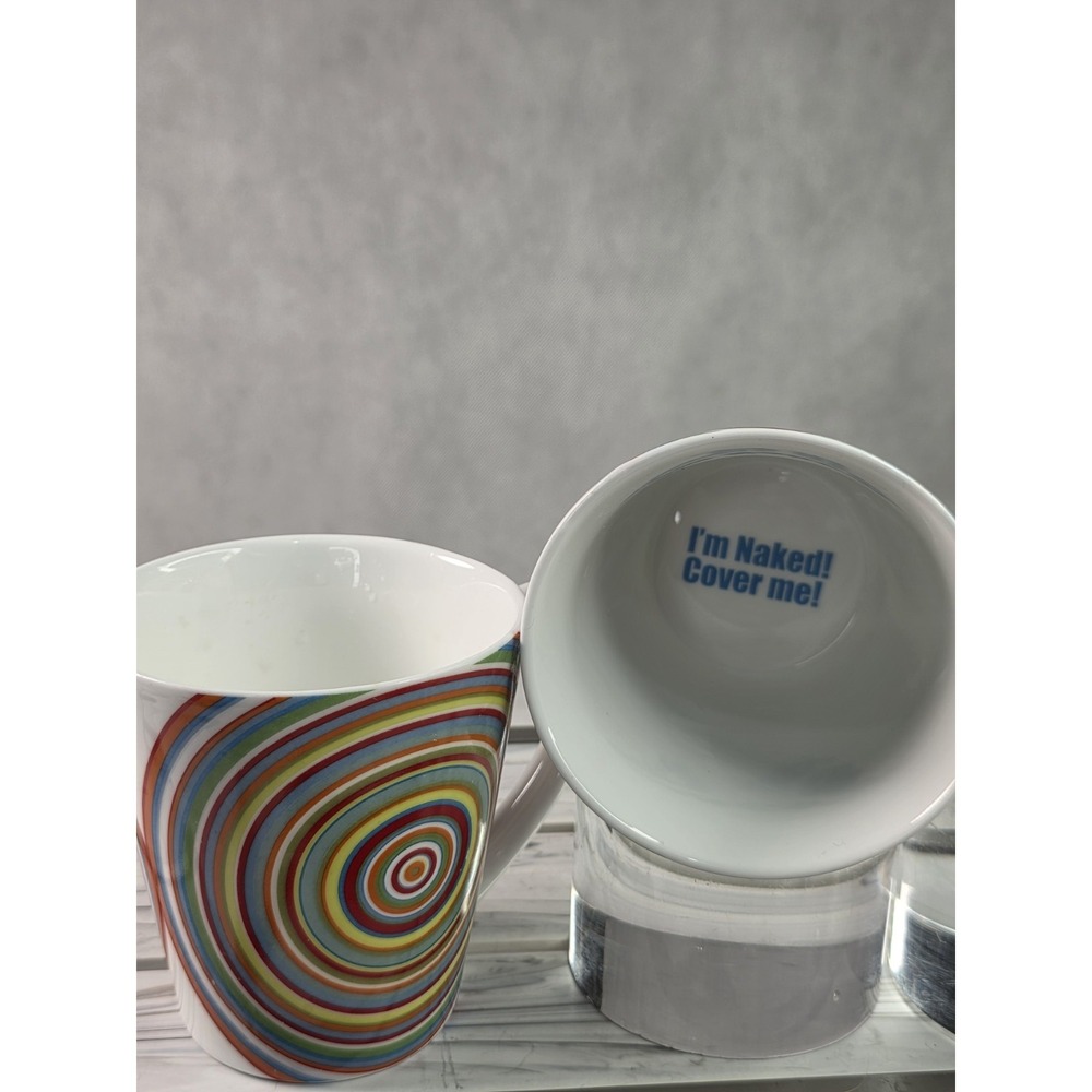 Caribou Coffee Mug Lot Of 2  CosmicCircular Swirl -"I'm Naked! Cover Me!"